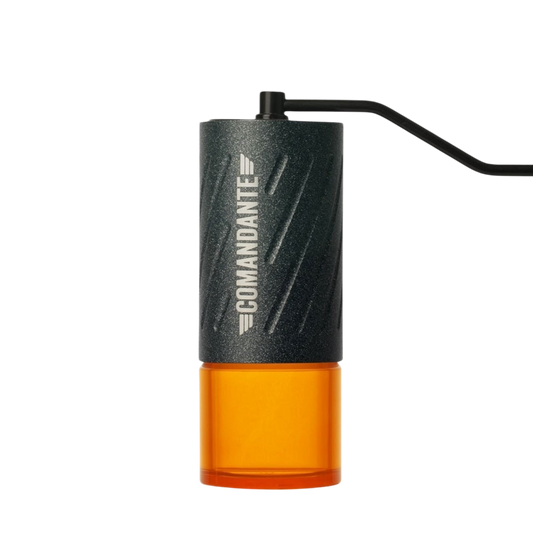 Kaffeekontor Bayern Comandante C60 Baracuda manual coffee grinder with a dark grey unibody and amber bean container.