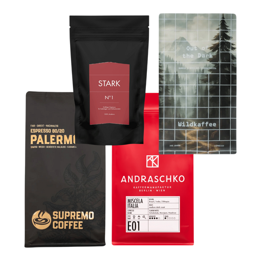 Kaffeekontor Bayern espresso sampler pack featuring four distinct coffee bags with dark, red, and illustrated labels.