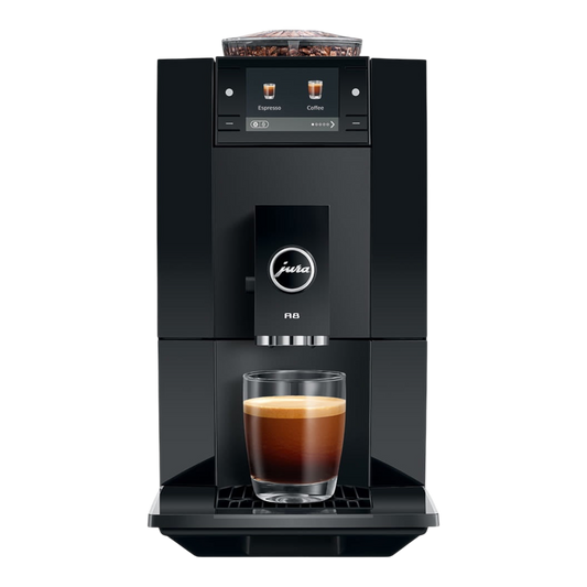 Kaffeekontor Bayern JURA A8 compact black automatic coffee machine with color display and glass of espresso