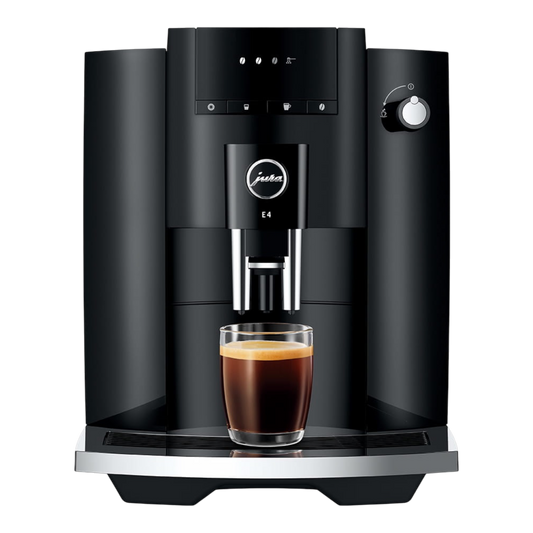 Kaffeekontor Bayern JURA E4 black automatic coffee machine brewing a fresh espresso in a glass cup