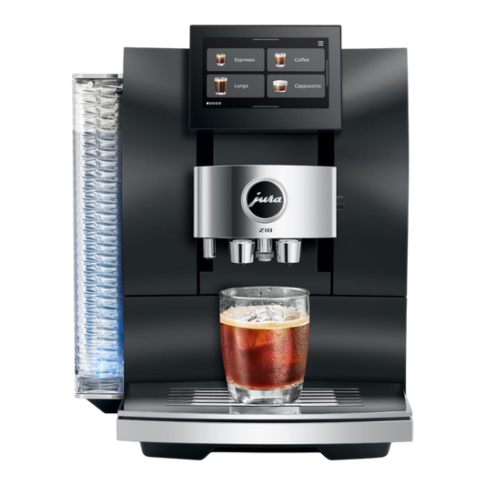 Kaffeekontor Bayern Z10 EC automatic coffee machine in black with a glass of iced coffee and touchscreen display
